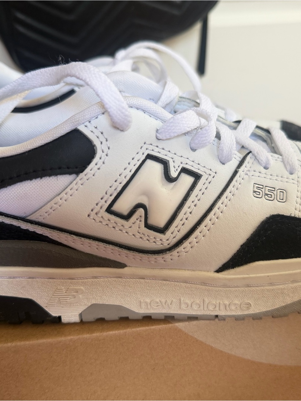 New Balance Kids 550 Sneakers in White and Black